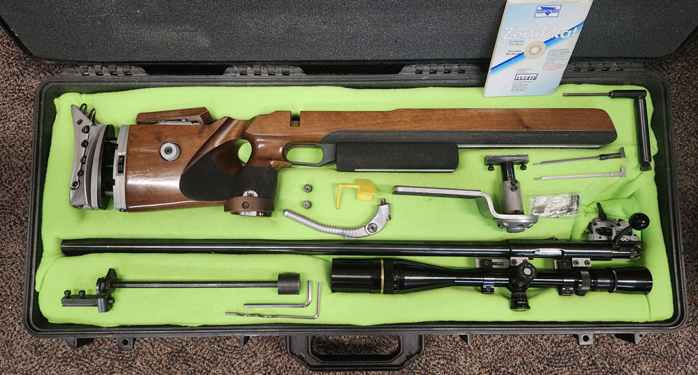 USED – Anschutz 1813 Walnut hook butt plate with Leupold 6.5-20 EFR